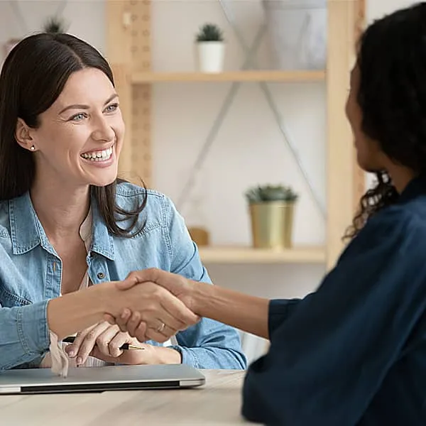 woman-shaking-hands-builds-strong-first-impression